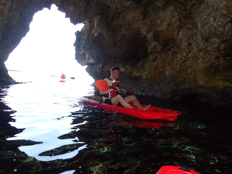 4-hour Ayia Napa SeaCaves Guided Kayaking from Limnara beach - Beneath Lovers’ Bridge