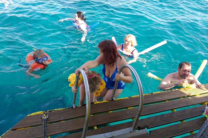 Atlantis Turtle Watching Cruise & Snorkelling Adventure - Swimming and snorkeling in clear water