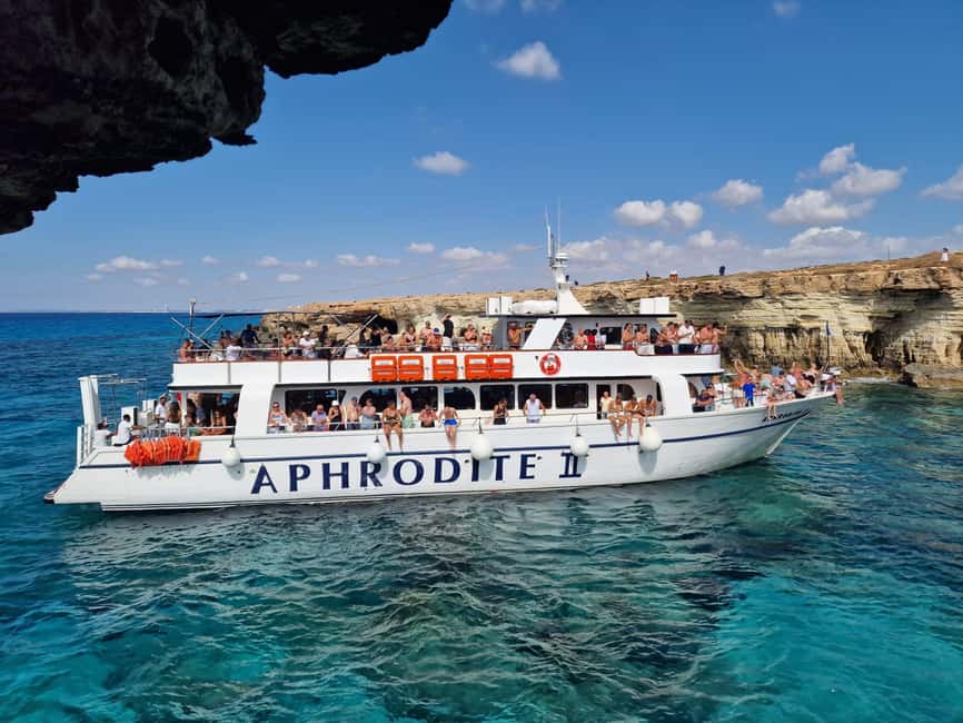 Ayia Napa: Lazy Day Cruise, Turtle Cove, Blue Lagoon & Lunch - Sea caves and Cape Greco from the water