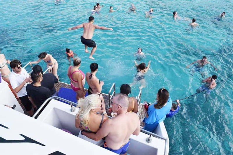 BBQ Boat: Nafsika II Sunset BBQ, Waterslide & Swimming Trip - The Blue Lagoon swim stop