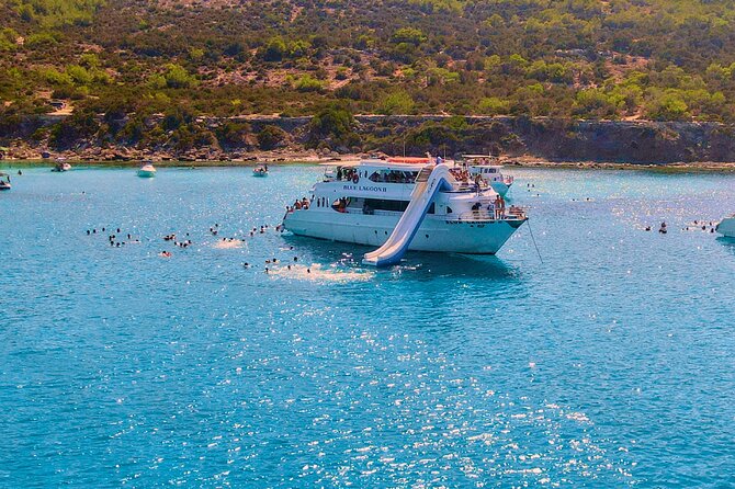 Blue Lagoon (Akamas) Bus & Boat Tour with Water Slide From Paphos - Manolis Bay, St. George Island, and the church