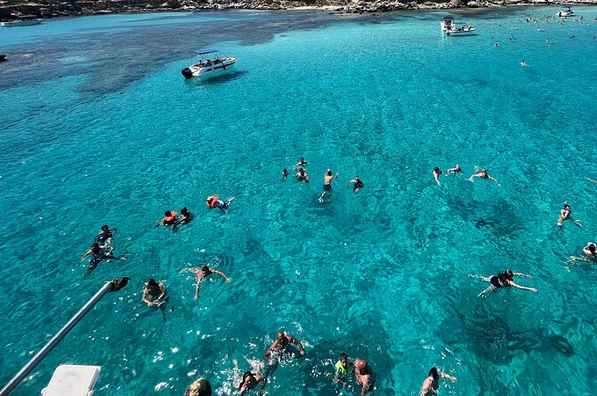 Blue Lagoon cruise: giant slide, music & Paphos hotel transfers - Latchi Harbor and the three-hour cruise