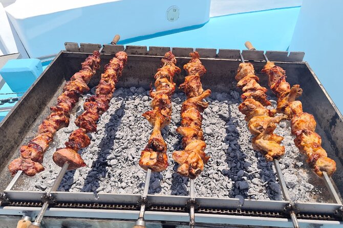 Demetris Chara Boat/Blue Lagoon boat trips with BBQ and SLIDE - The slide, swimming, and boat life