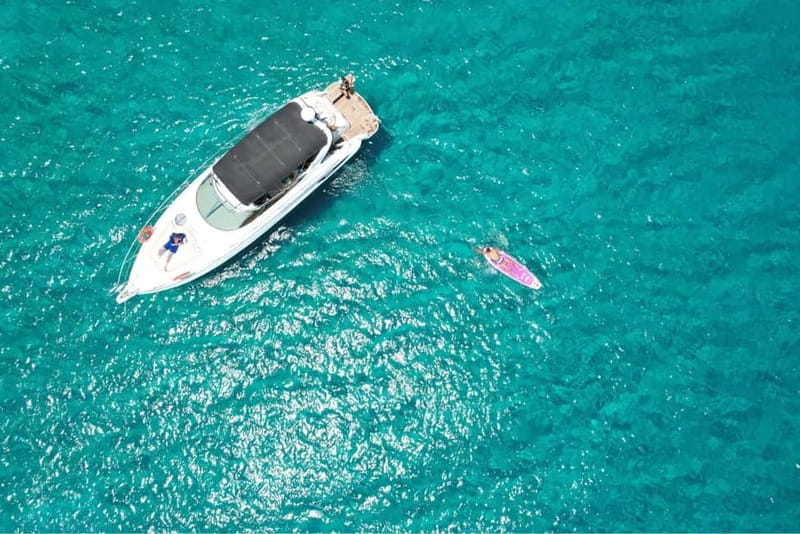 Explore the coastline blue lagoon and sea caves on Protaras. - A private Cranchi yacht along the Protaras coast