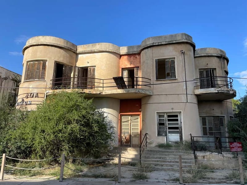 From Aya Napa/Protaras: Varosha Ghost Town Tour on a Red Bus - Entering Varosha with a map and a guide