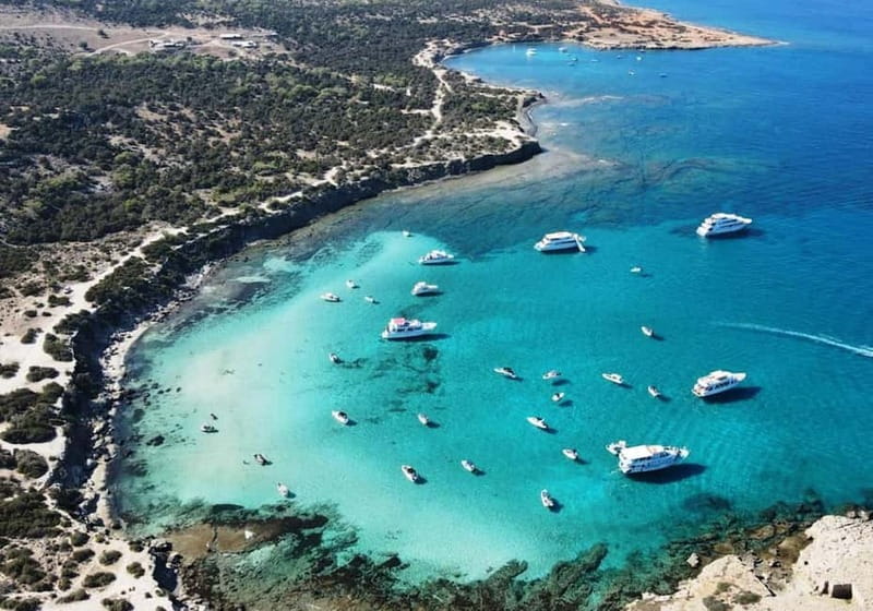 FROM LATCHI: Blue Lagoon Akamas Cruise - large water slide - Passing the Baths of Aphrodite