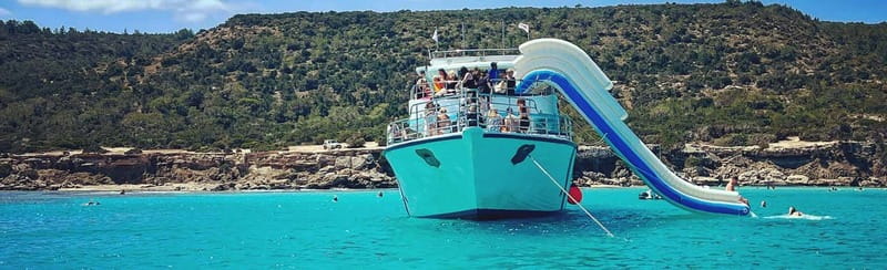 FROM LATCHI: Blue Lagoon Akamas Cruise - large water slide - Wine, fruit, and the onboard bar