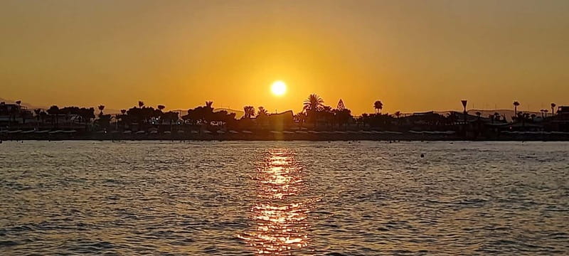 Larnaca: Sunset Cruise with Unlimited Wine & Beers - Mackenzie Beach and the 20-minute swim