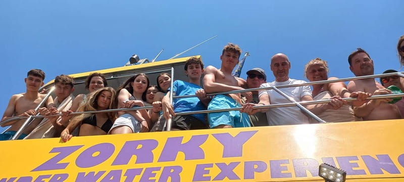 Larnaca: Yellow Submarine Swim Cruise with Unlimited Drinks - The return route past Finikoudes Beach
