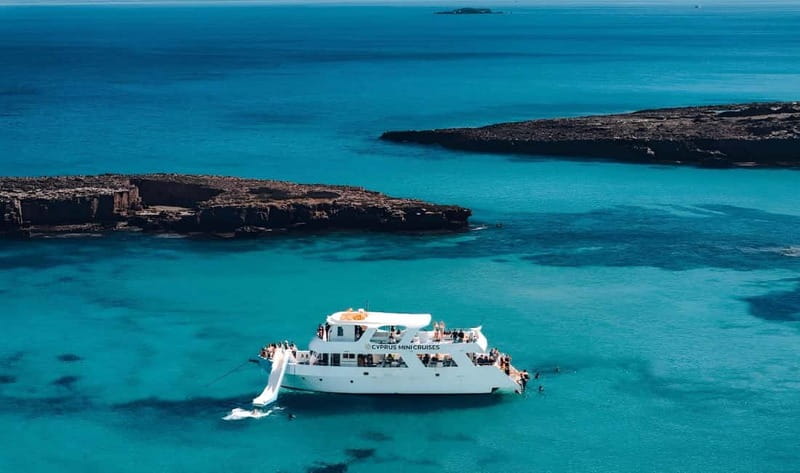 Paphos: Blue Lagoon Afternoon Cruise with Swim, BBQ & Wine - From Paphos hotels to Latchi port