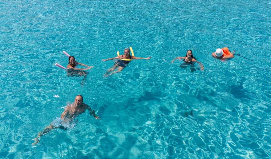 Paphos Blue Lagoon Cruise: Slide, Music & Hotel Transfer - The Akamas Peninsula by boat
