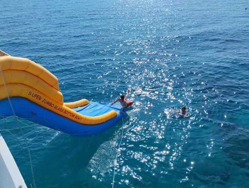 Paphos: Glass Bottom Boat Trip with Swimming or Snorkeling - The short swim stop on the 90-minute cruise