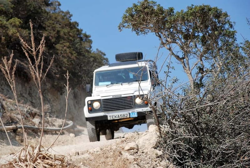 Paphos: Land Rover Jeep Safari Coastal Tour and Blue Lagoon - Sea caves and wind-shaped rock along the coast