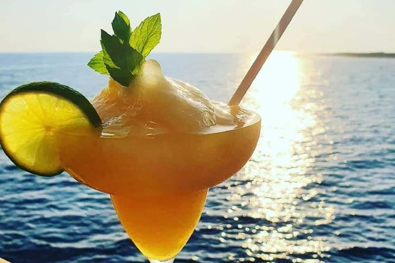 Paphos: Wave Dancer Sunset Cruise with BBQ and Swimming - The Riccos Bay swim stop