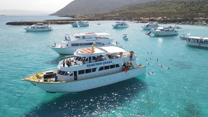 Polis: Blue Lagoon Boat Tour with Optional Barbecue Lunch - The transport question: hotel pickup or harbor arrival?