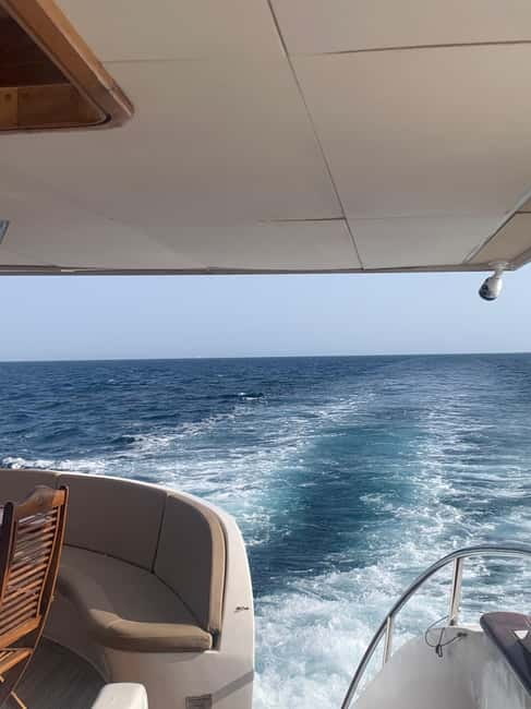 Protaras: 80s and 90s Sunset Cruise with Cypriot Dinner & DJ - Passing Fig Tree Bay and Cape Greco