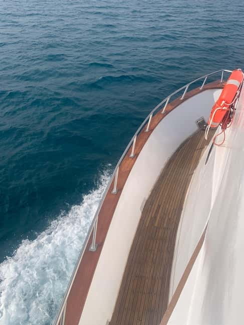 Protaras: 80s and 90s Sunset Cruise with Cypriot Dinner & DJ - Swimming near Turtle Bay