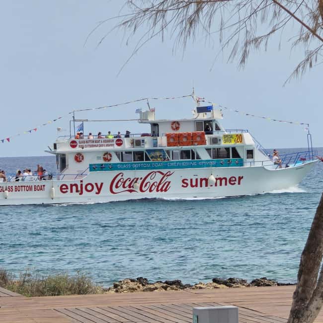 Protaras Blue Lagoon Sunset Tour with Pizza & Champagne - Cape Greco National Forest Park from the sea