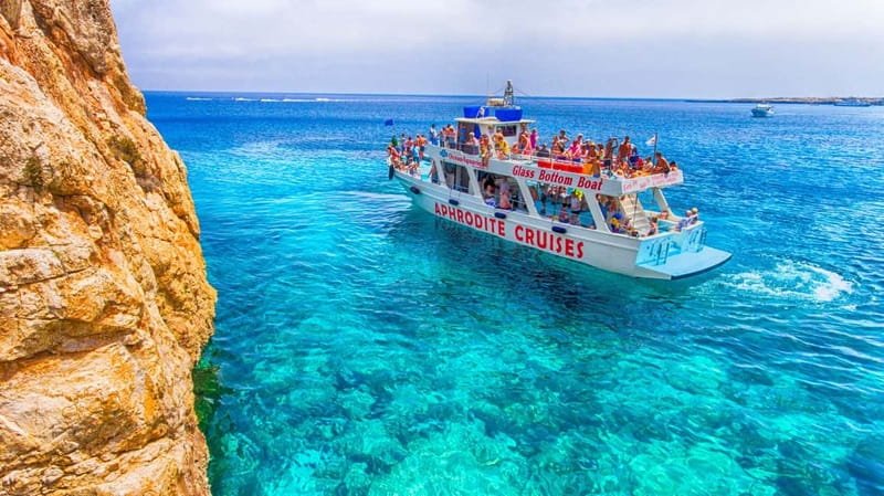 Protaras: Turtle Cove & Blue Lagoon Sunset Cruise - Cape Greco and Kamara tou Koraka from the sea