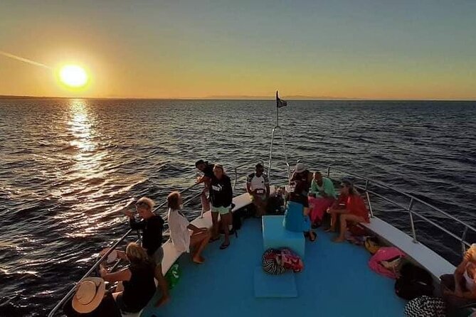 Sunset Boat Trip to Cape Greco and Blue Lagoon - Music, seating, and the party-boat question