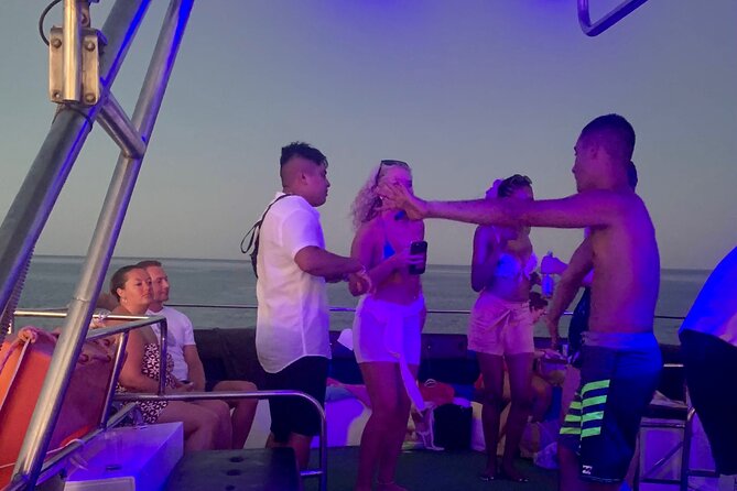 The Original 80/90's & DJ Sunset Cruise - ADULTS 16+ - Sailing toward Agioi Anargyroi Church