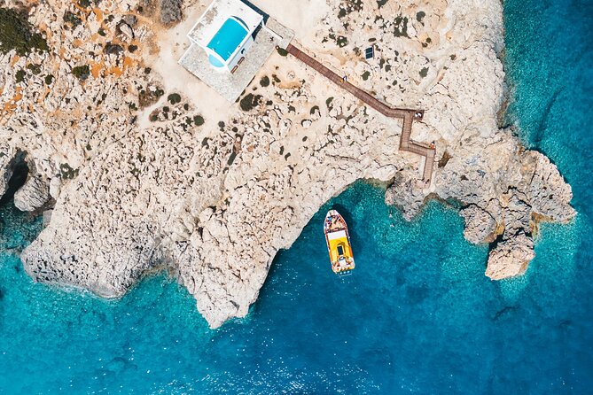 Yellow Boat Cruises: Afternoon Family Blue Lagoon & Turtle Cruise - Cape Greco puts the scenery on center stage