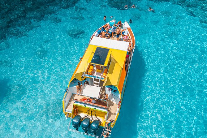 Yellow Boat Cruises: Afternoon Family Blue Lagoon & Turtle Cruise - Konnos Bay offers a quieter coastal view
