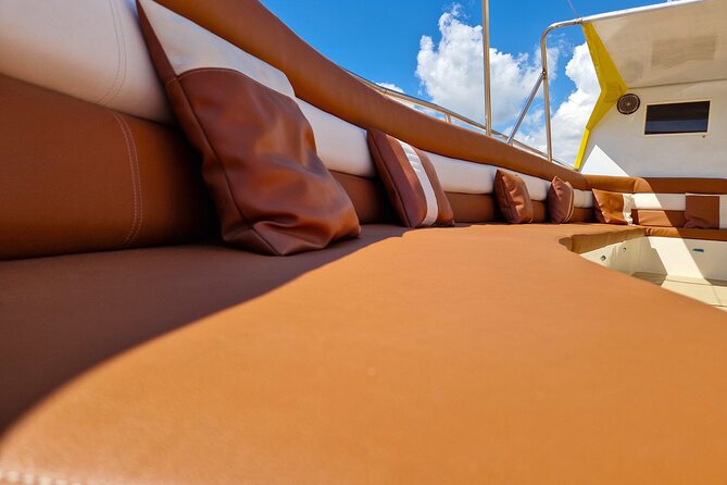 Yellow Boat Cruises: Afternoon Family Blue Lagoon & Turtle Cruise - Saint Anargioi Chapel sits above the sea caves